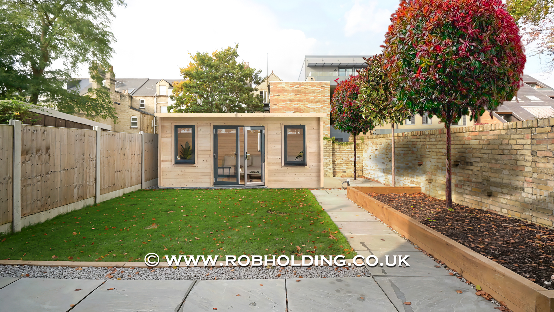Retouched garden photograph showing a landscaped garden with a summer house