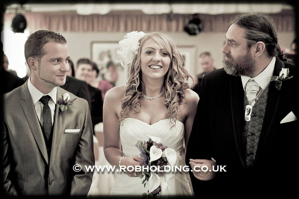 Bride laughing during the wedding ceremony