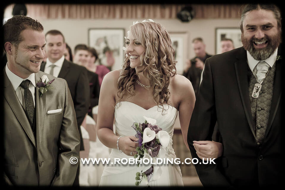 Bride and groom walking together at the ceremony