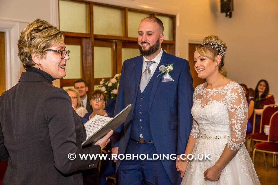 Registrar speaking as the bride and groom stand together