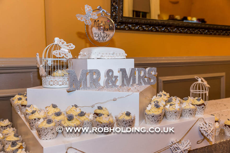 Dessert table decorated with "Mr & Mrs" lettering